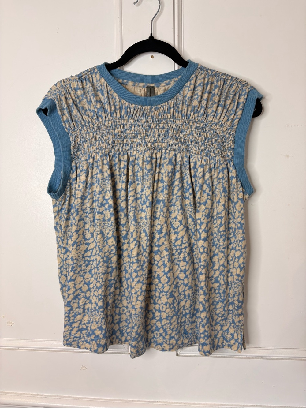 Anthropologie sleeveless Top with smocked yoke cream & light blue